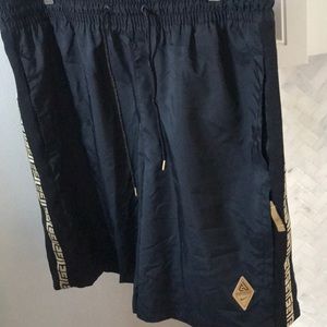 Gold Nike athletic shorts
